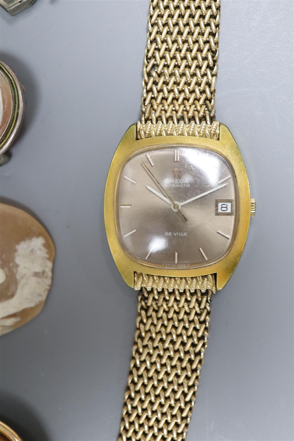 Assorted jewellery including a Victorian silver locket, three cameo shells etc and a Omega De Ville automatic wrist watch